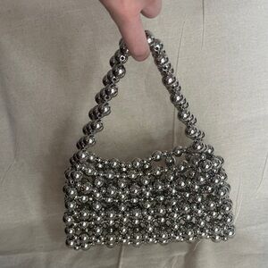 Space age silver metallic ball purse